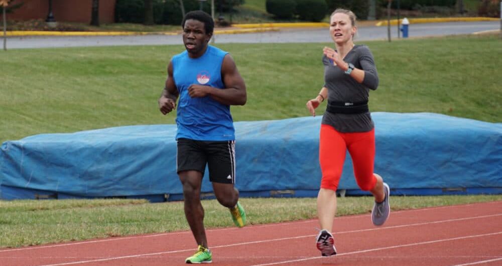 Nick Silver (left) runs on the track alongside guide Liz Houghton